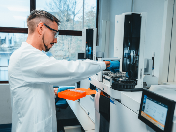 Laboratory staff at work with test equipment