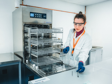 Laboratory staff at work with test equipment
